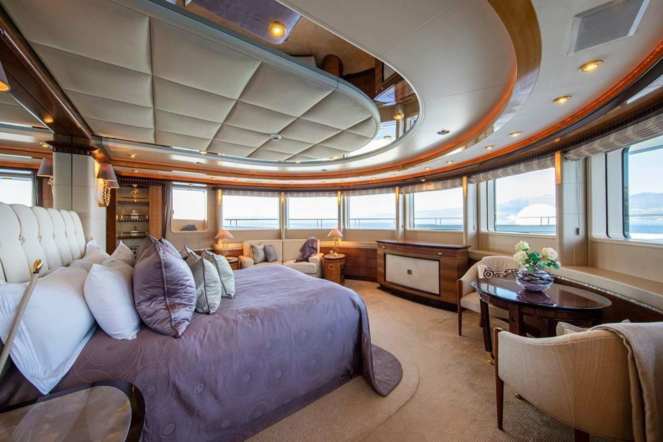 a large bedroom with a large bed aboard LADY MAJA I Yacht for Sale