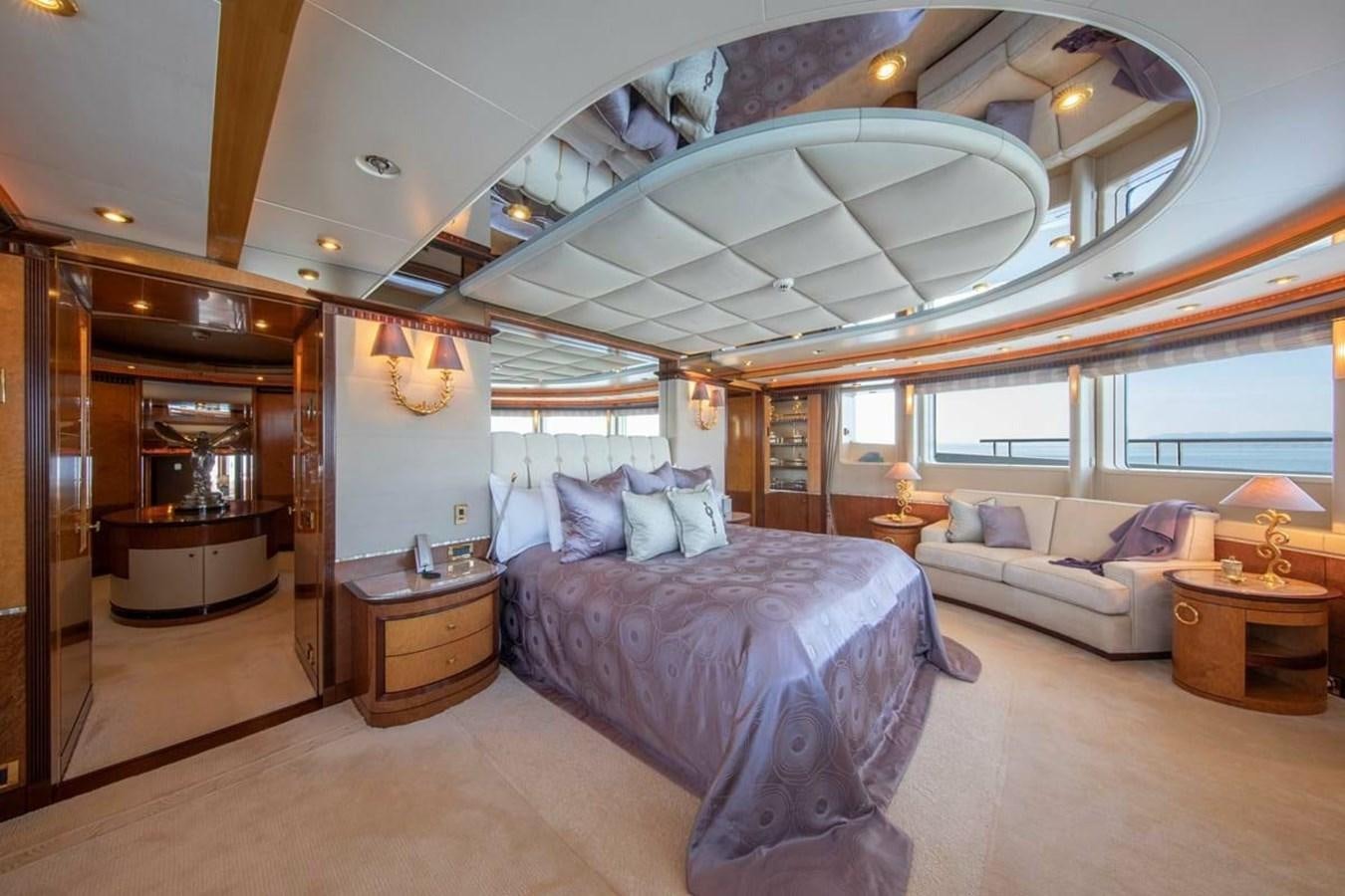 a large bedroom with a large bed aboard LADY MAJA I Yacht for Sale
