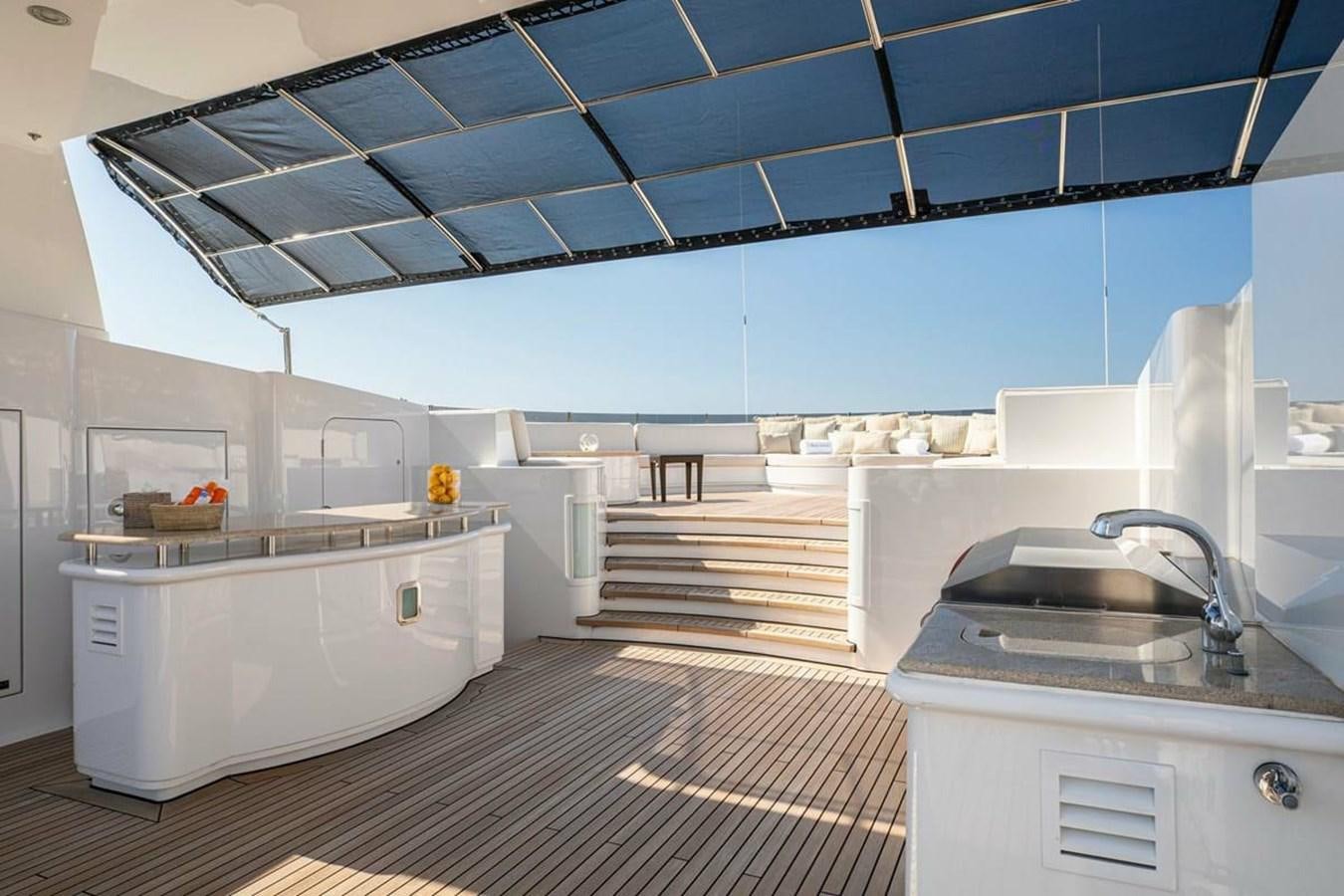 a kitchen with a sink and a large window aboard LADY MAJA I Yacht for Sale