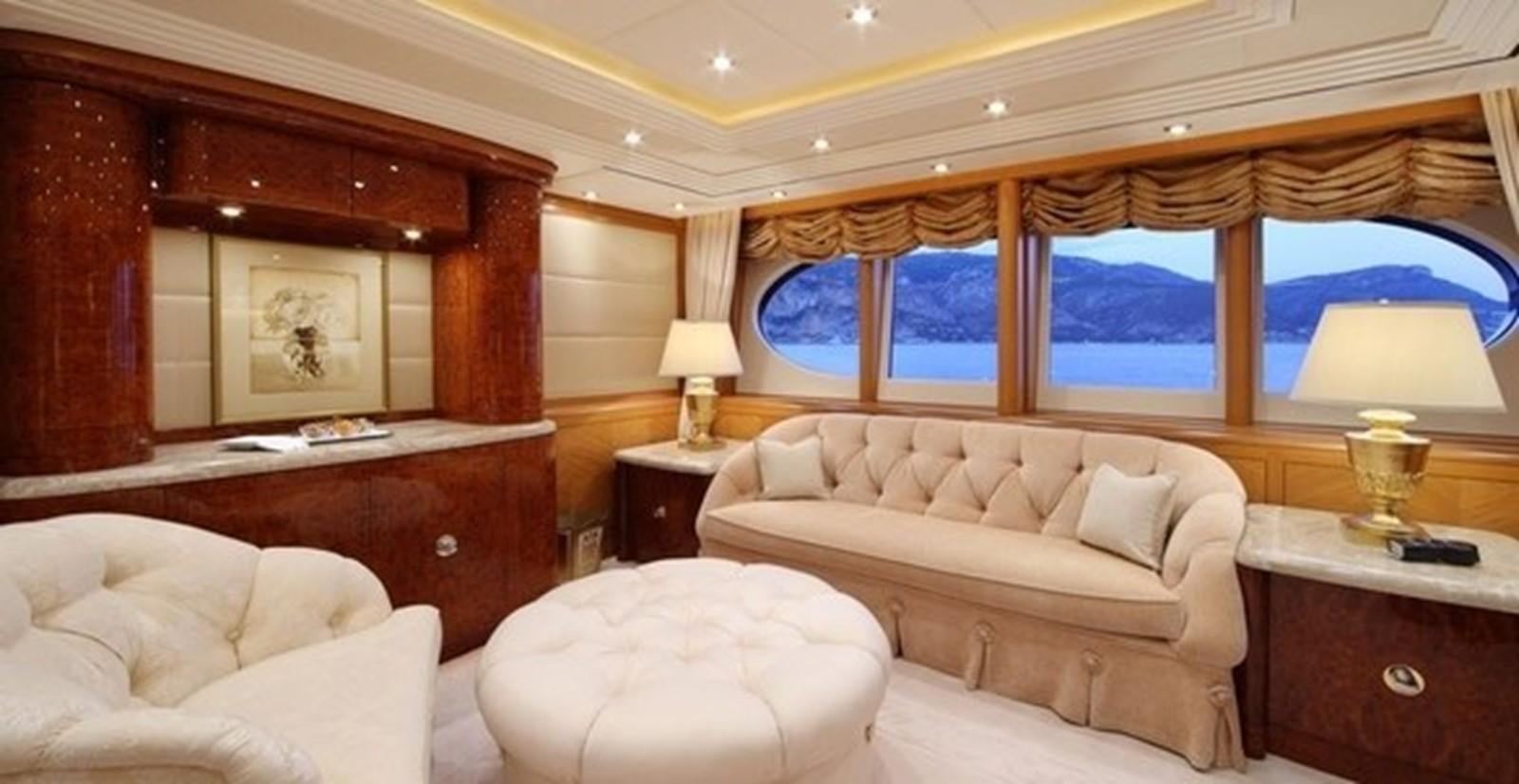 a room with a bed and a window aboard CAPRI I Yacht for Sale