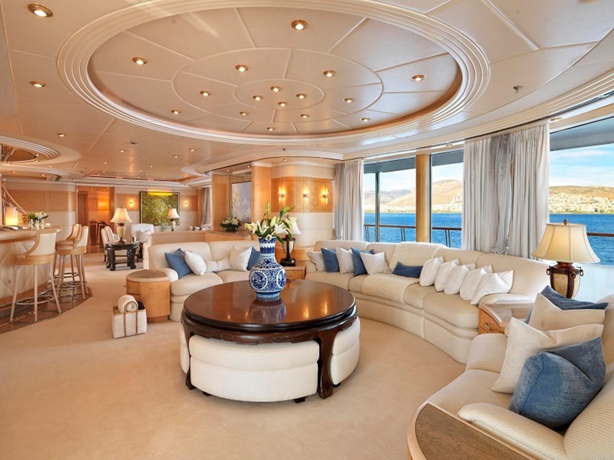 a living room with a large open window aboard CAPRI I Yacht for Sale
