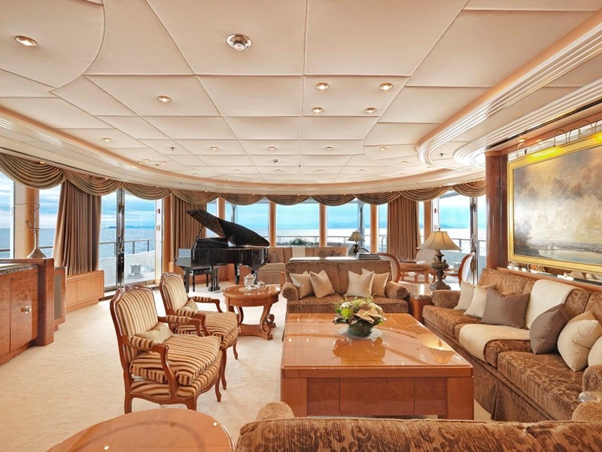 a living room with a large window aboard CAPRI I Yacht for Sale