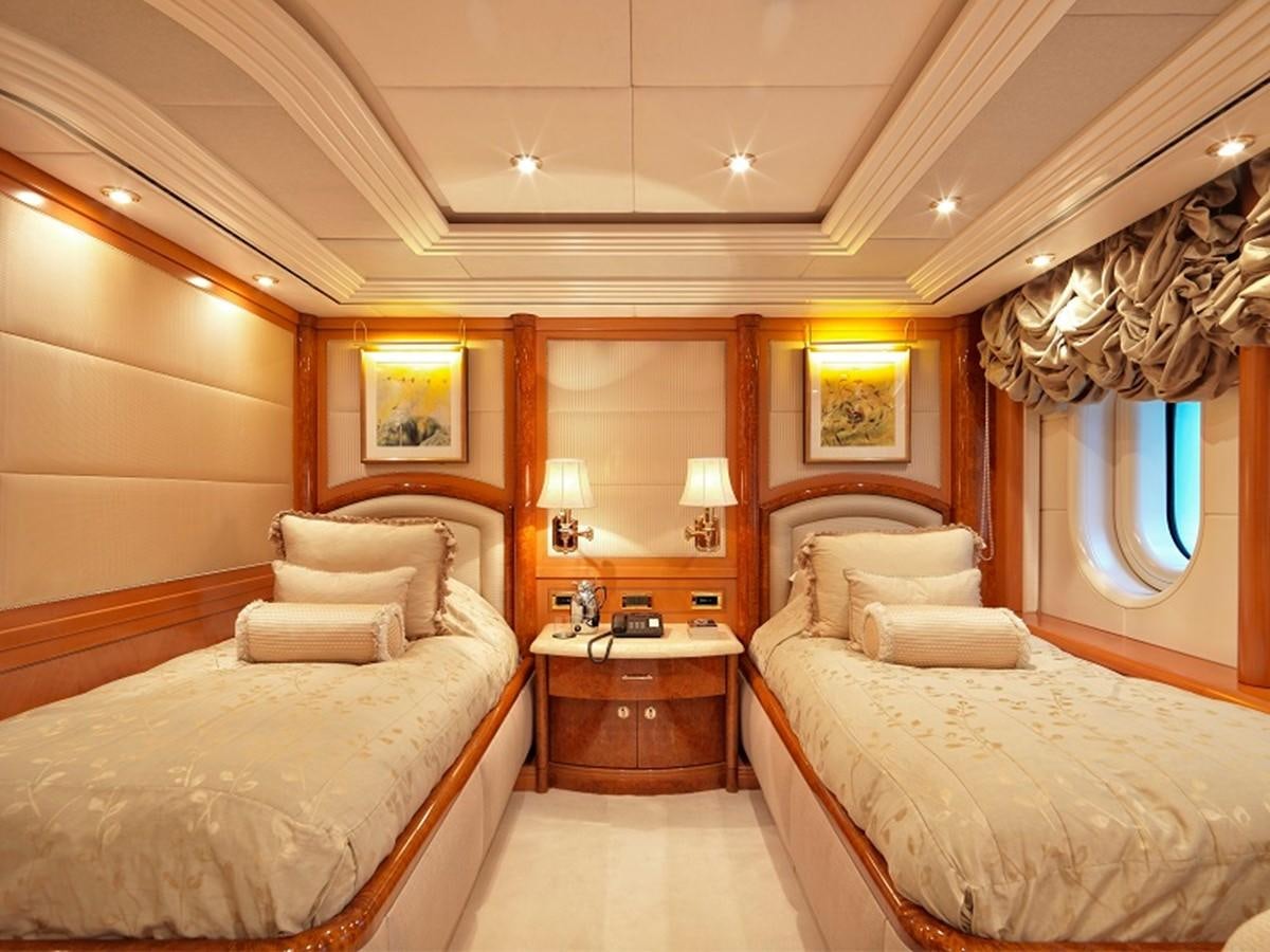a room with a couple of beds aboard CAPRI I Yacht for Sale