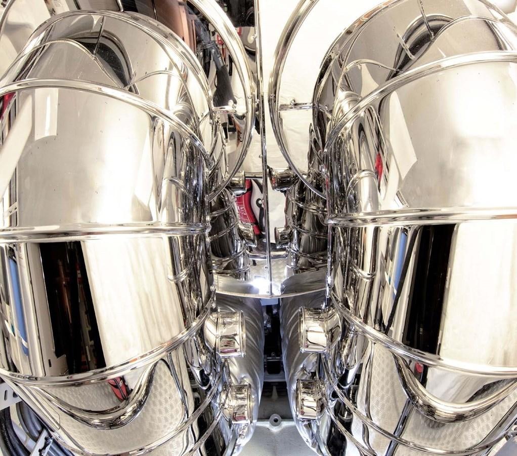 a group of silver and black pipes aboard HALO Yacht for Sale