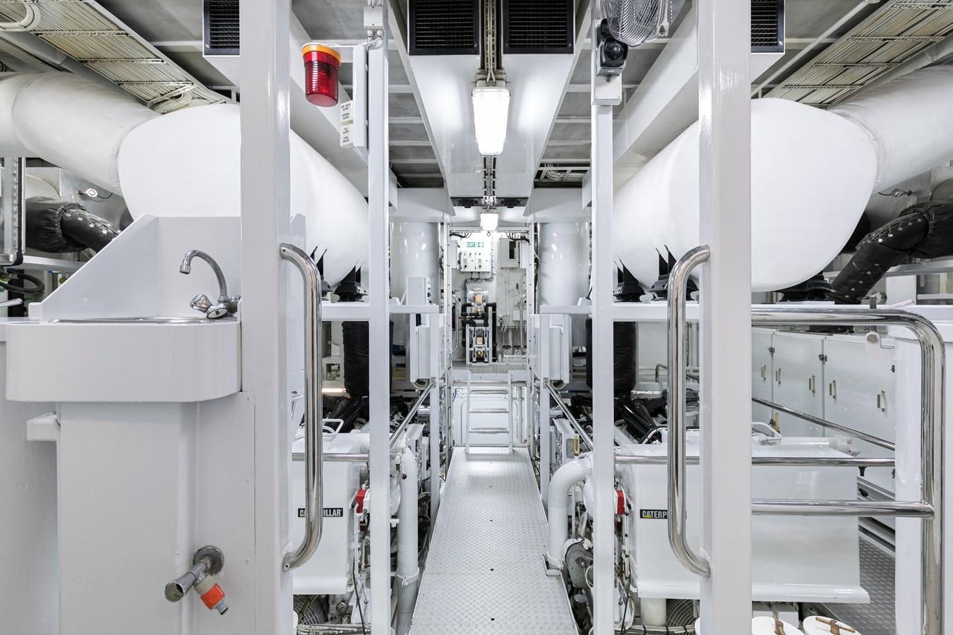 a room with several white machines aboard SEA HUNTRESS Yacht for Sale