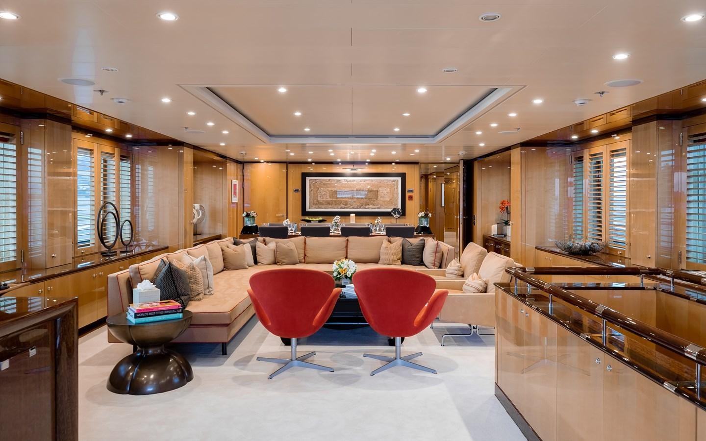 a large living room with a large open floor plan aboard LIND Yacht for Charter