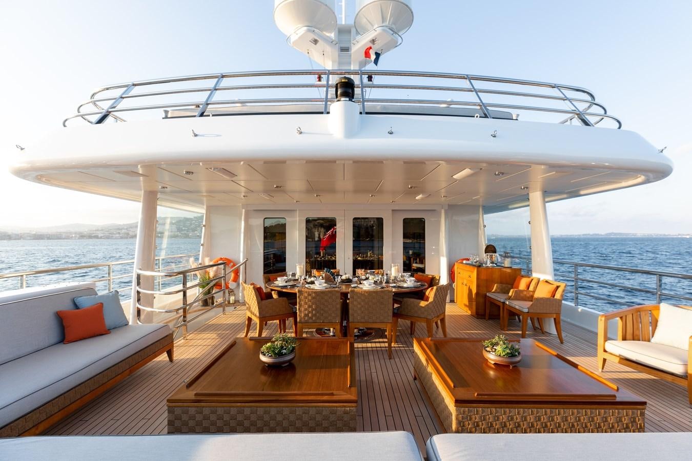 a living room with a large ship aboard LIND Yacht for Charter