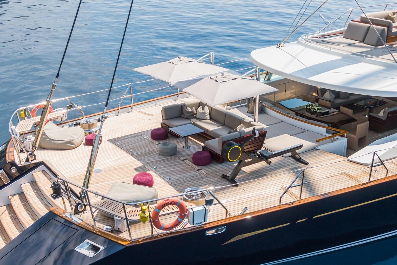 a boat docked at a pier aboard PRANA Yacht for Charter
