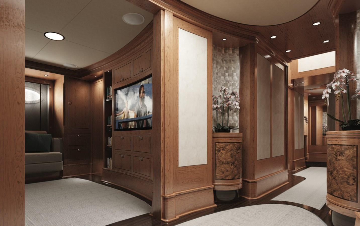 a room with a tv and a fireplace aboard RAINBOW II Yacht for Sale