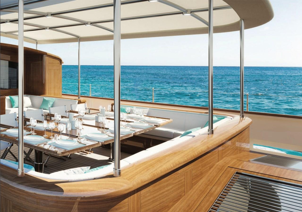 a room with a table and chairs on it aboard RAINBOW II Yacht for Sale