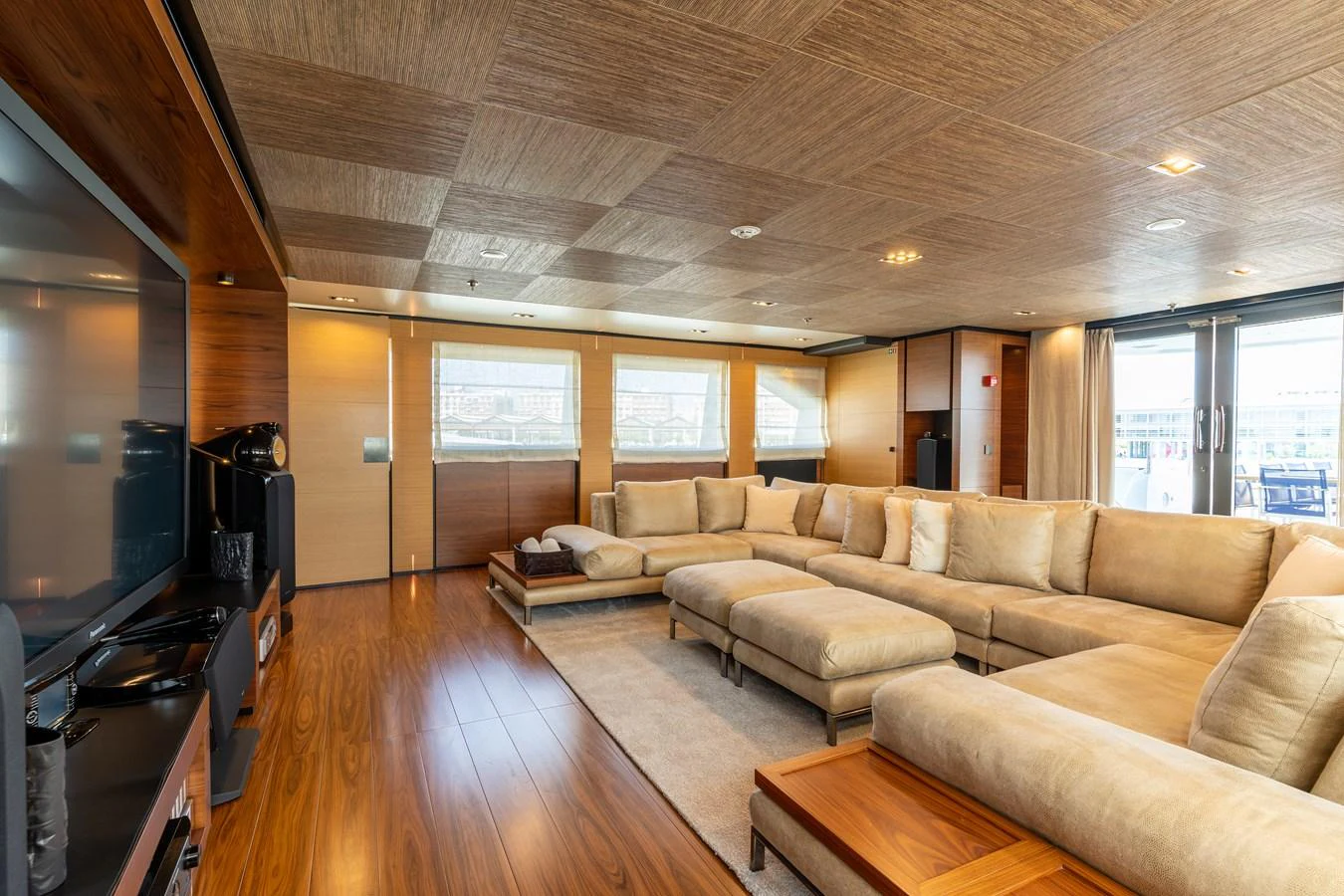 a living room with a wood floor aboard UNDER CONTRACT!   SAINT  2012 ISA 500-2 POP @ Yacht for Sale