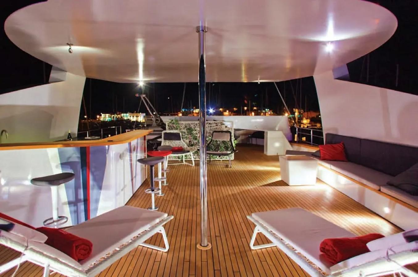 a room with a large mirror aboard JOY ME Yacht for Charter