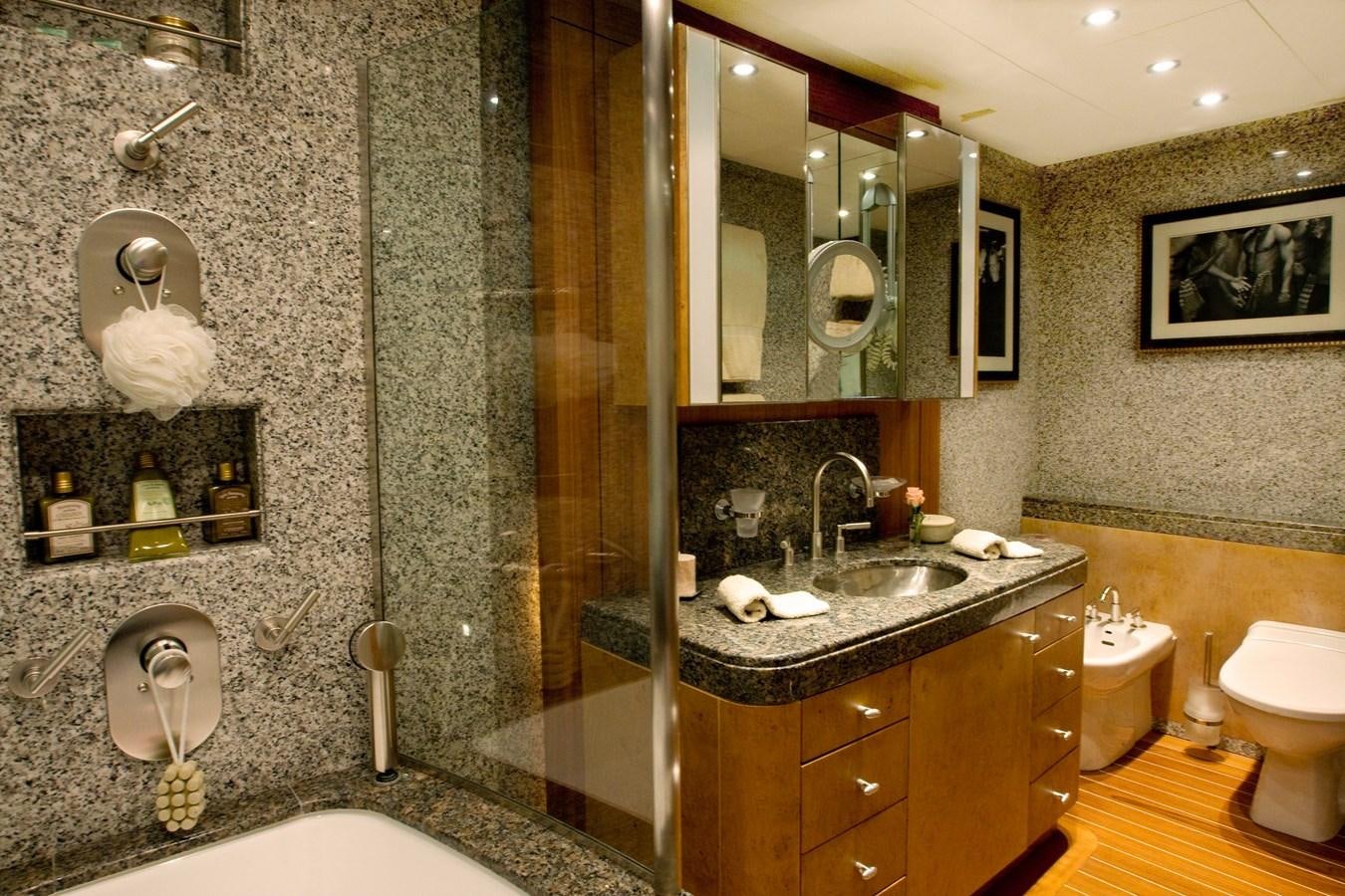 a bathroom with a marble counter top aboard QUEEN AIDA Yacht for Sale