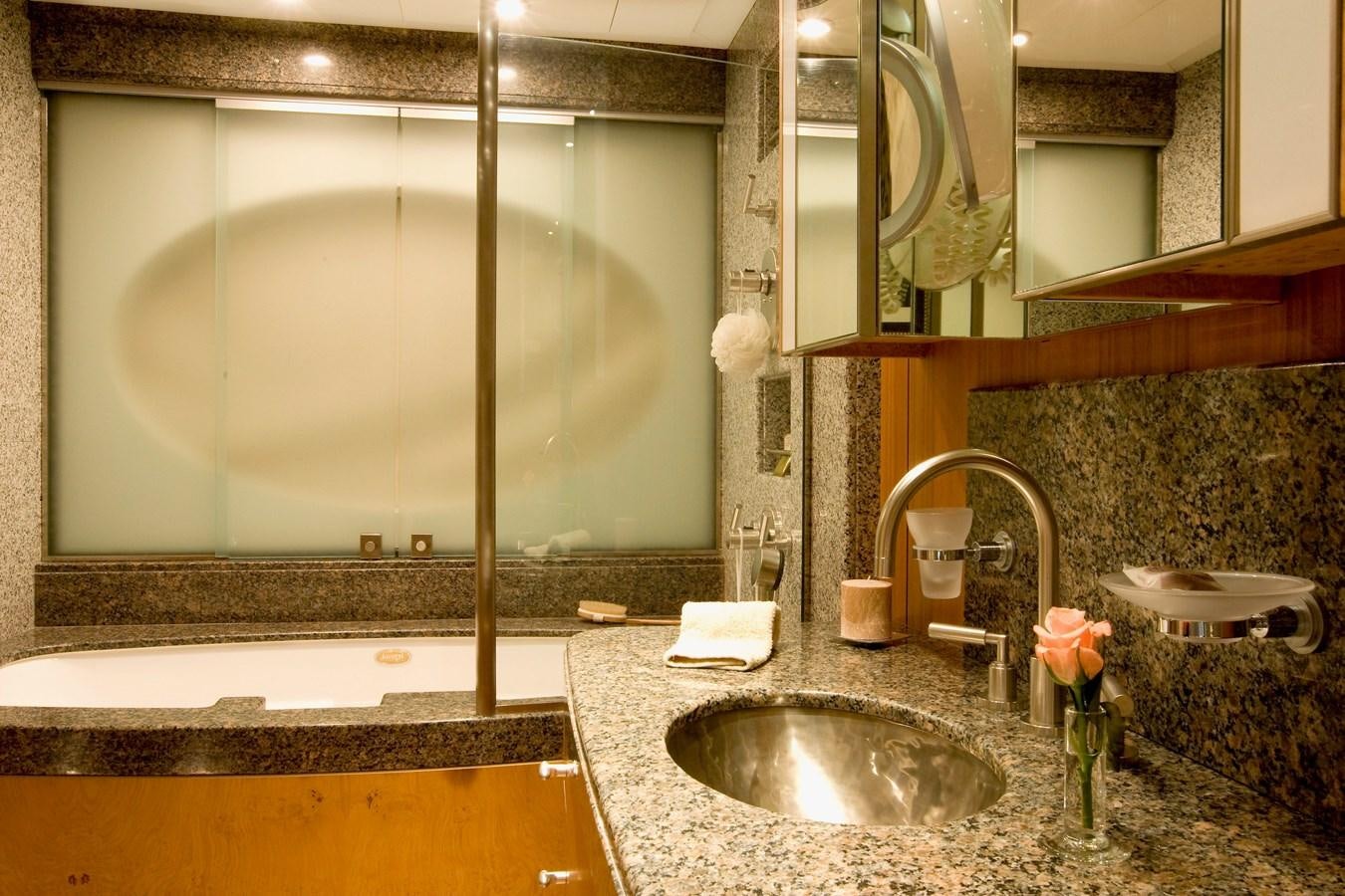 a bathroom with a large mirror aboard QUEEN AIDA Yacht for Sale
