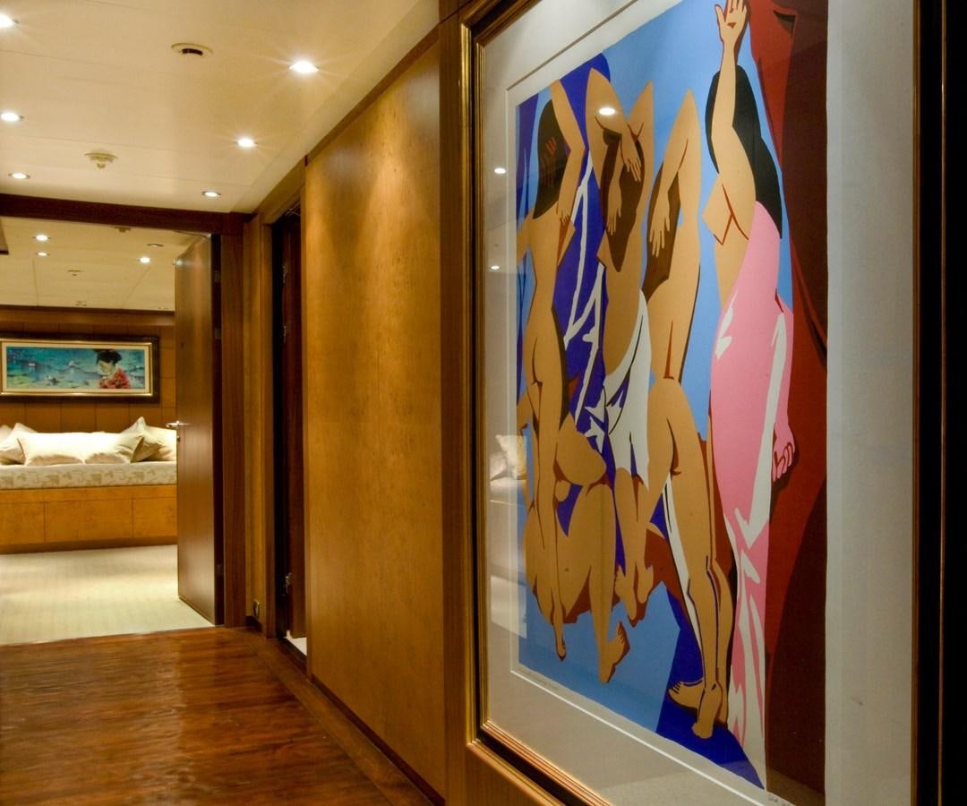 a room with a large painting aboard QUEEN AIDA Yacht for Sale