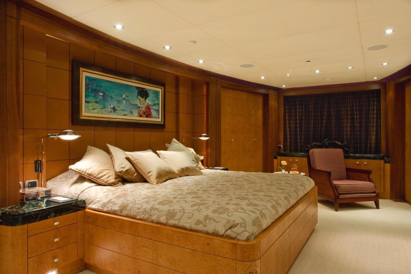 a large bed in a hotel room aboard QUEEN AIDA Yacht for Sale