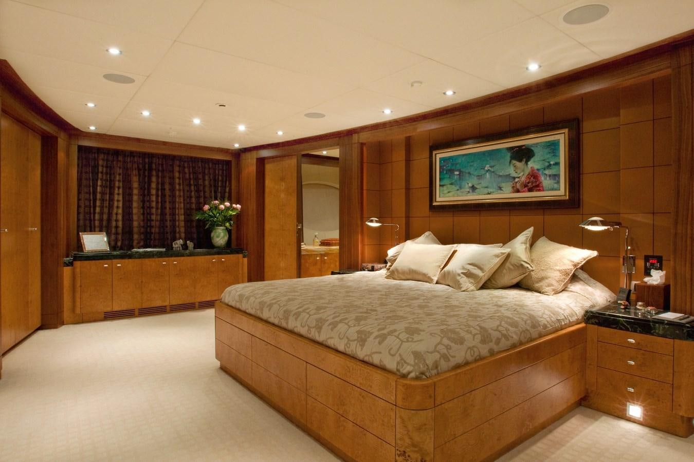 a large bedroom with a large bed aboard QUEEN AIDA Yacht for Sale