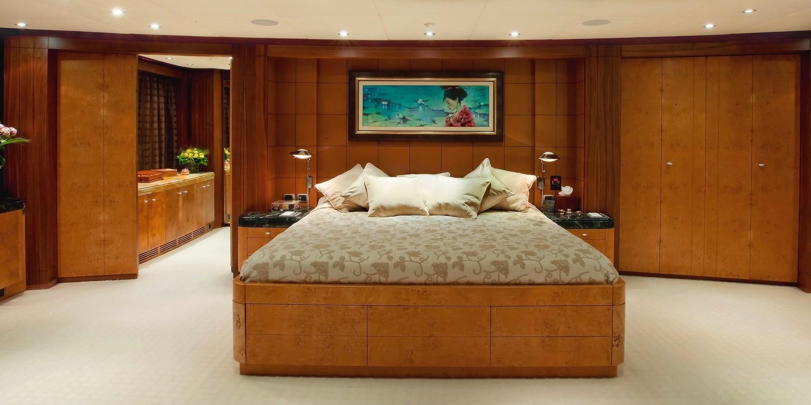 a bed in a room aboard QUEEN AIDA Yacht for Sale