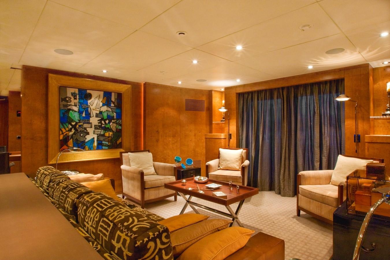 a living room with a large window aboard QUEEN AIDA Yacht for Sale