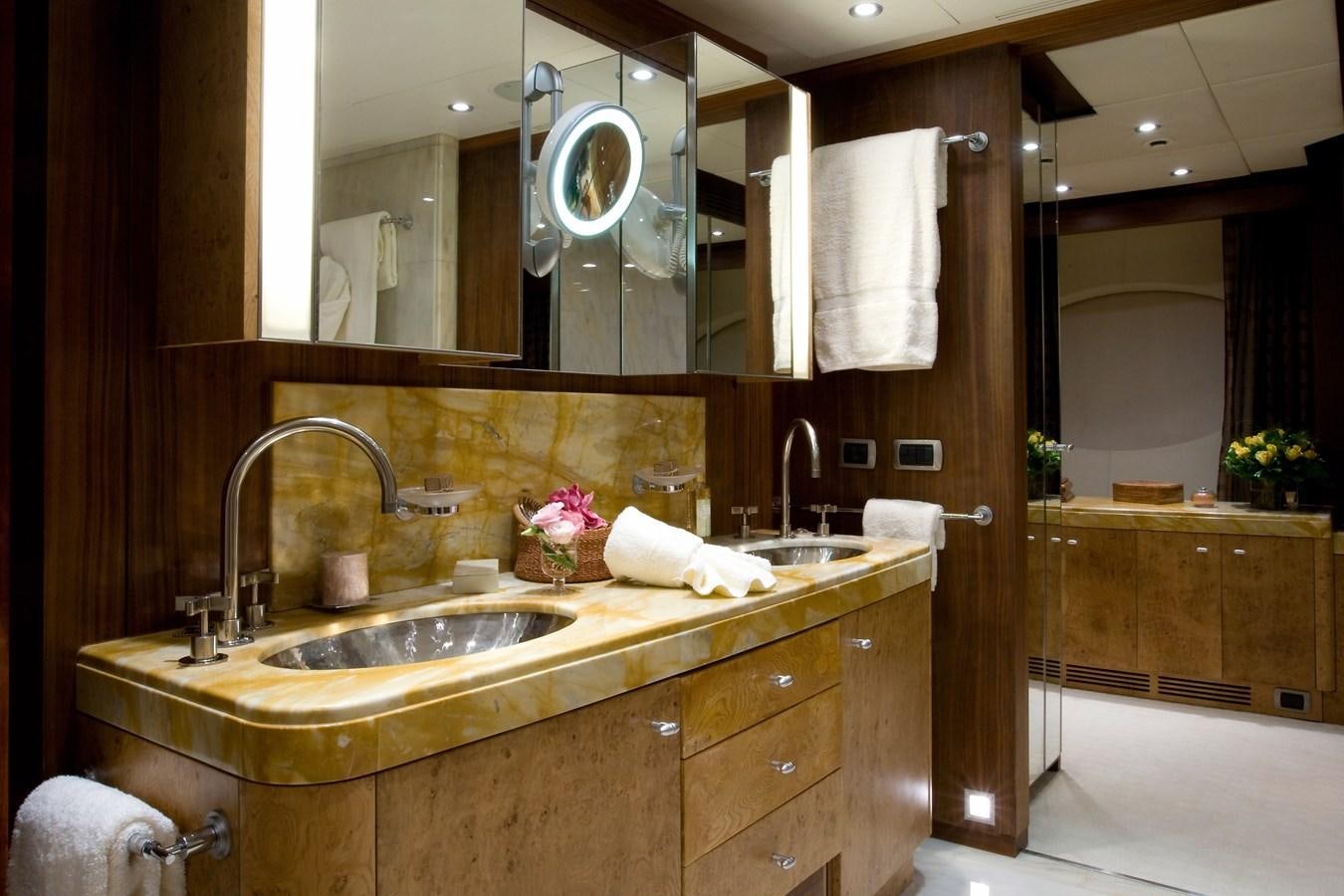 a bathroom with a large mirror aboard QUEEN AIDA Yacht for Sale