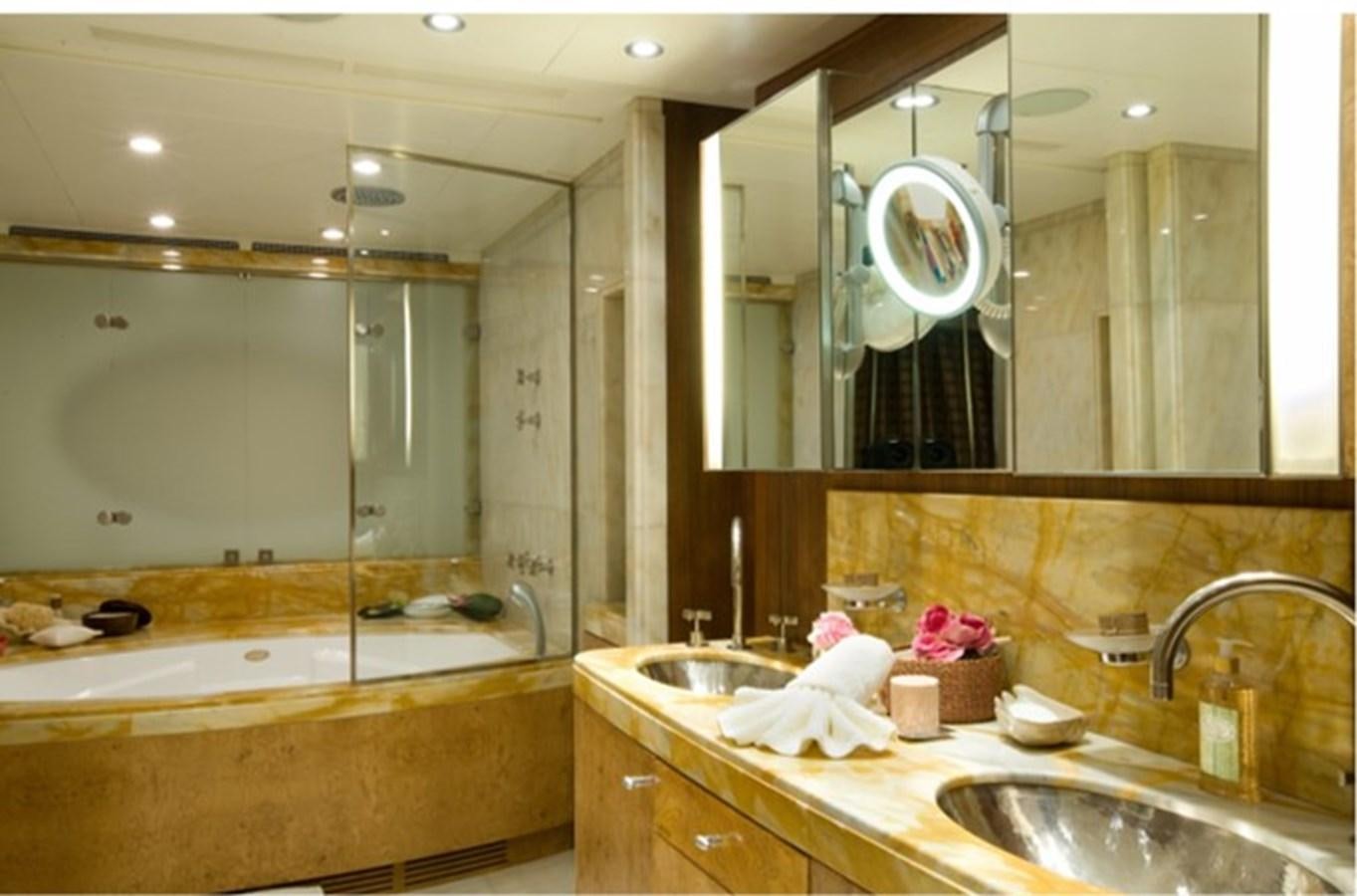 a bathroom with a large mirror aboard QUEEN AIDA Yacht for Sale