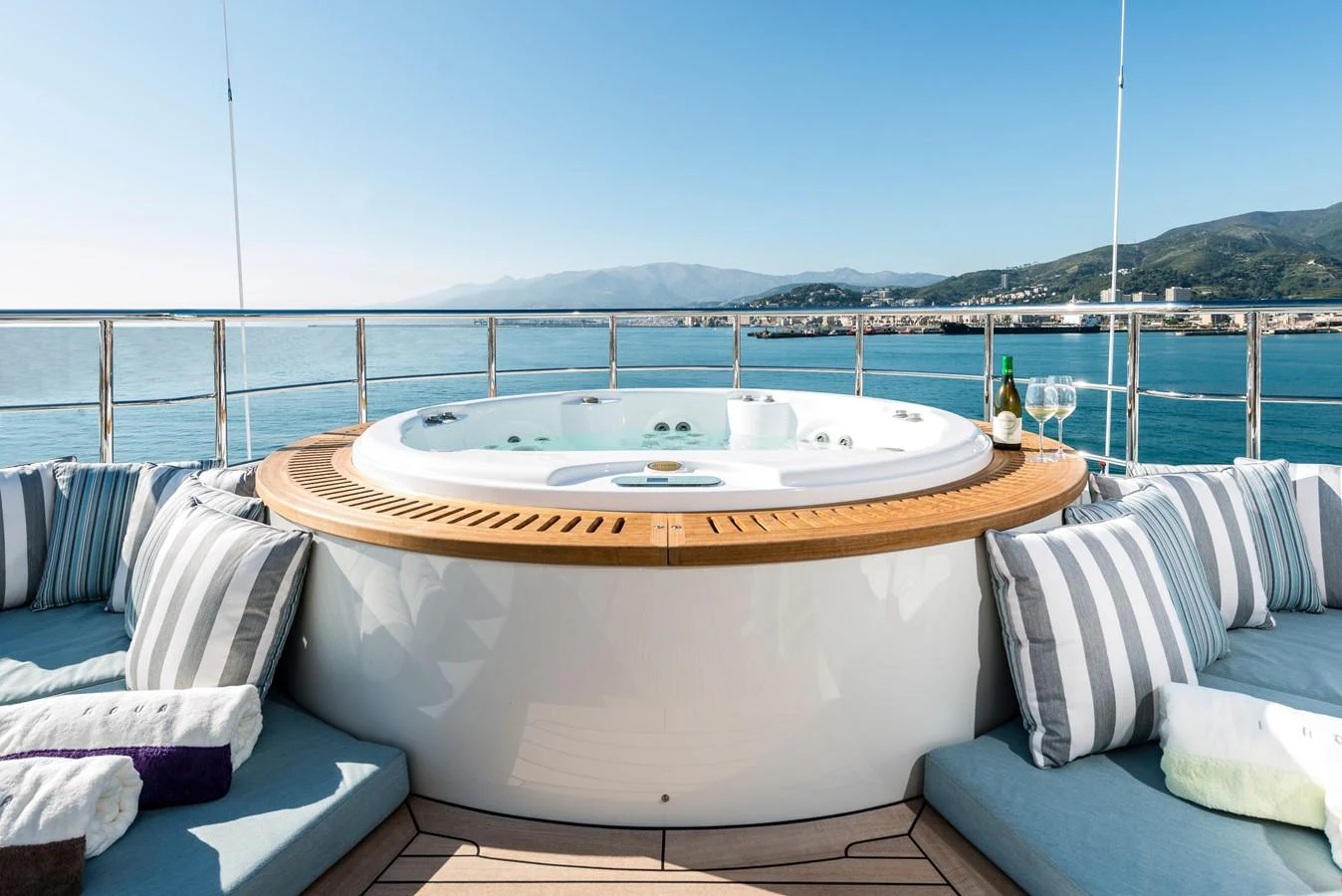 a large round table on a boat aboard I NOVA Yacht for Sale