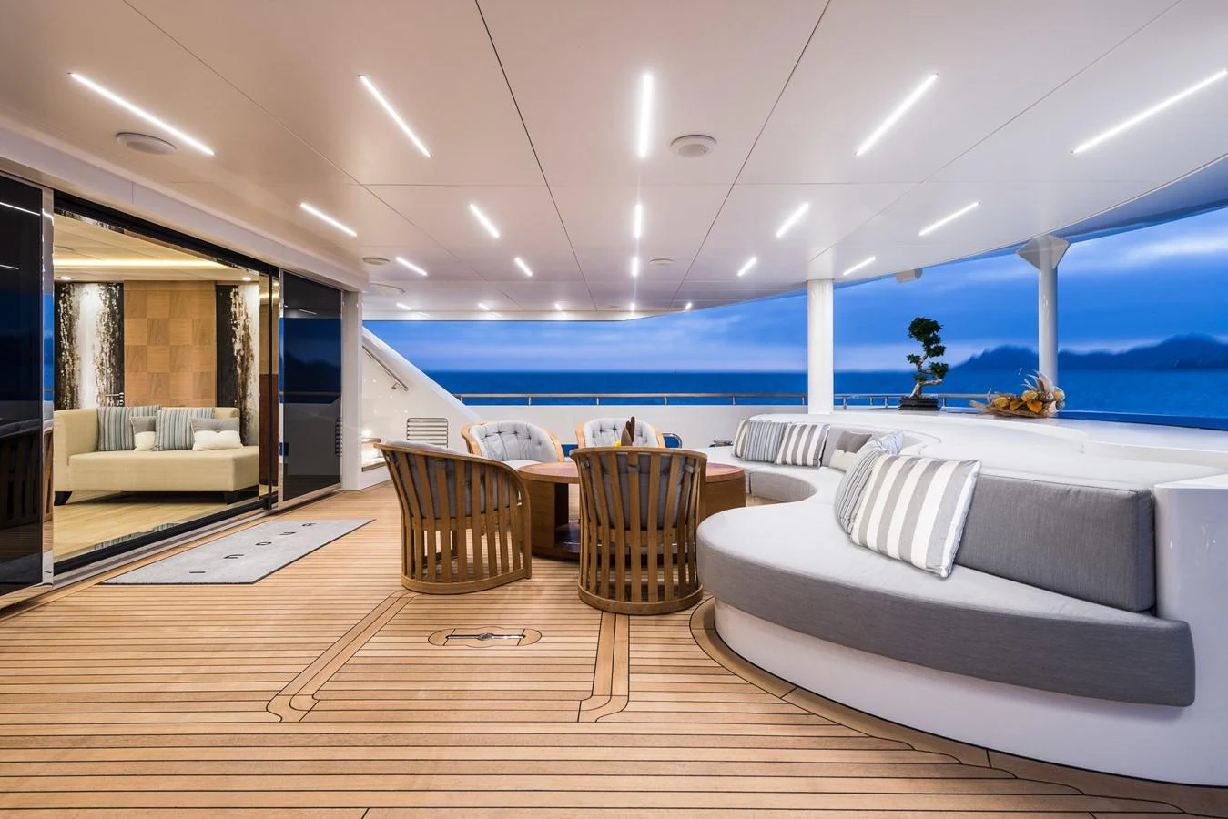 a living room with a couch and a pool aboard I NOVA Yacht for Sale