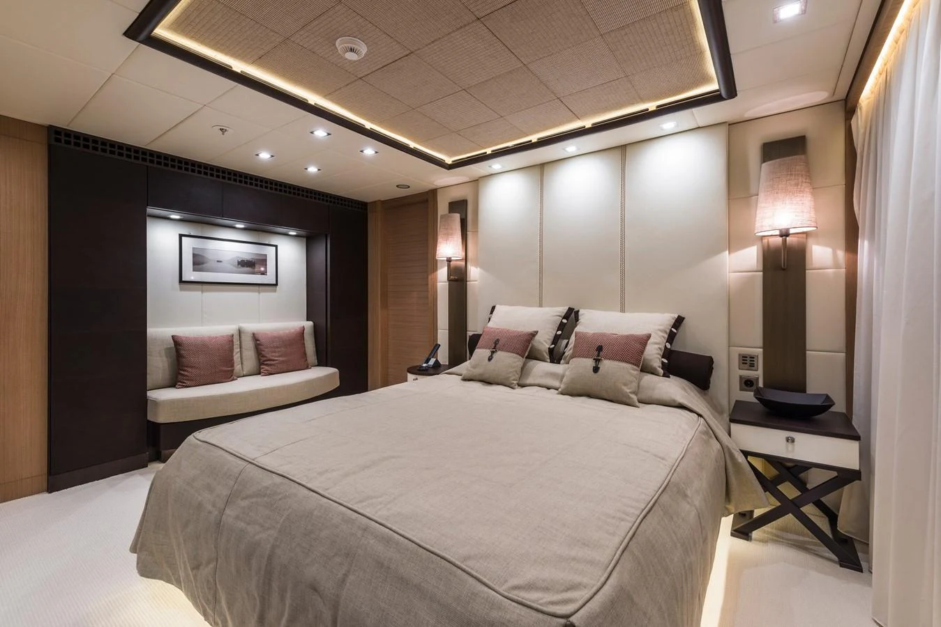 a hotel room with a bed and a lamp aboard I NOVA Yacht for Sale