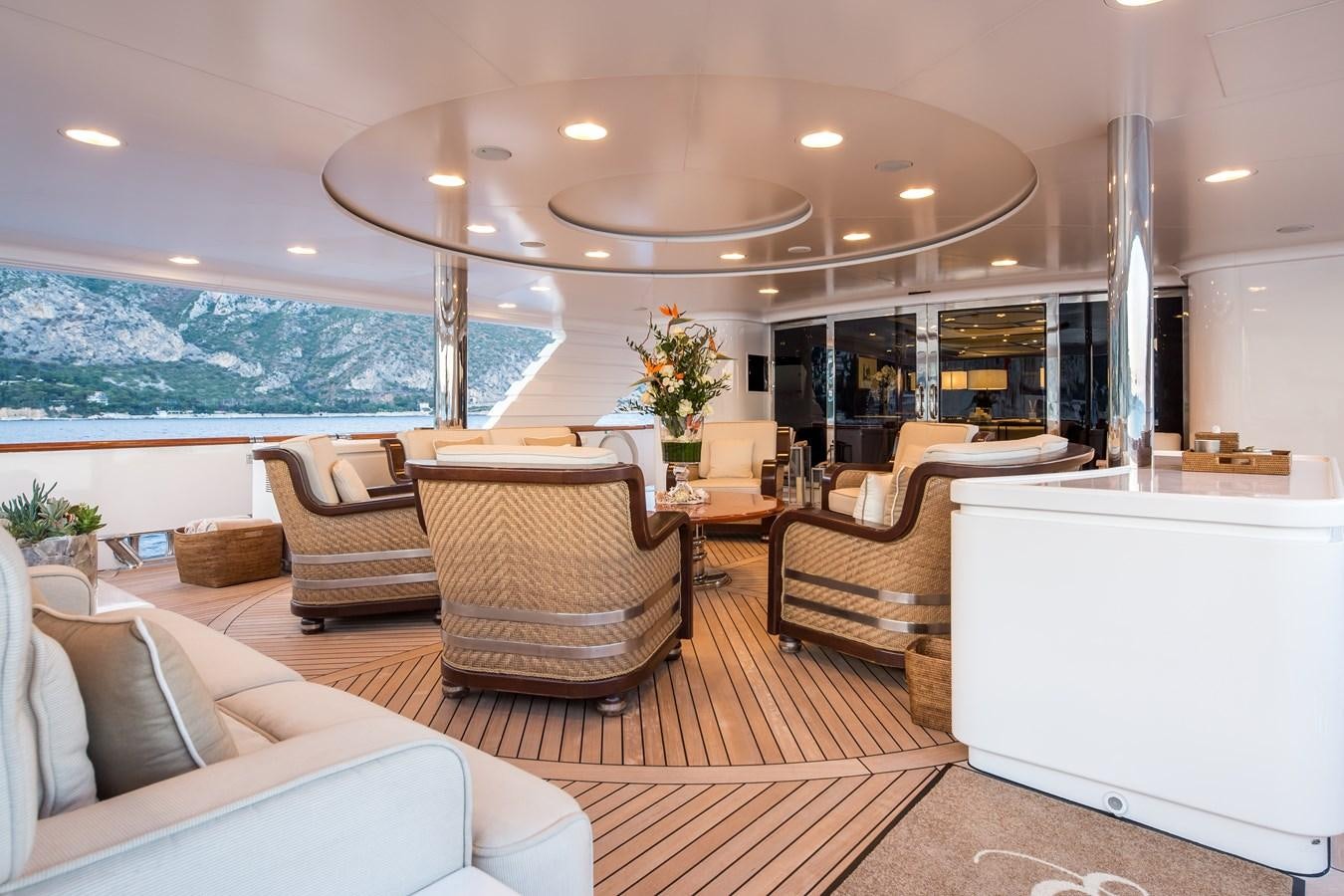 a living room with a large glass window aboard ELENI Yacht for Sale