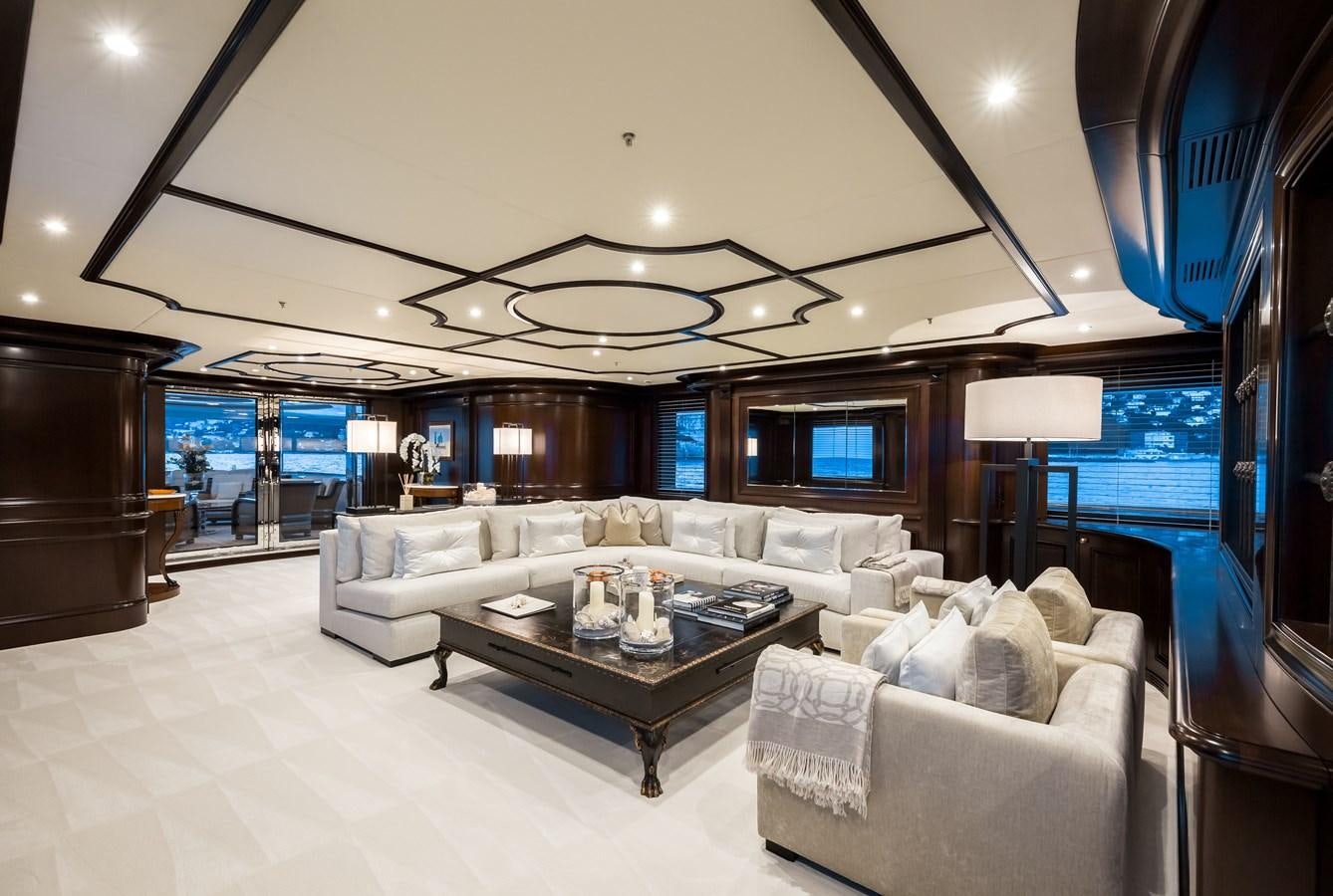 a living room with a large window aboard ELENI Yacht for Sale