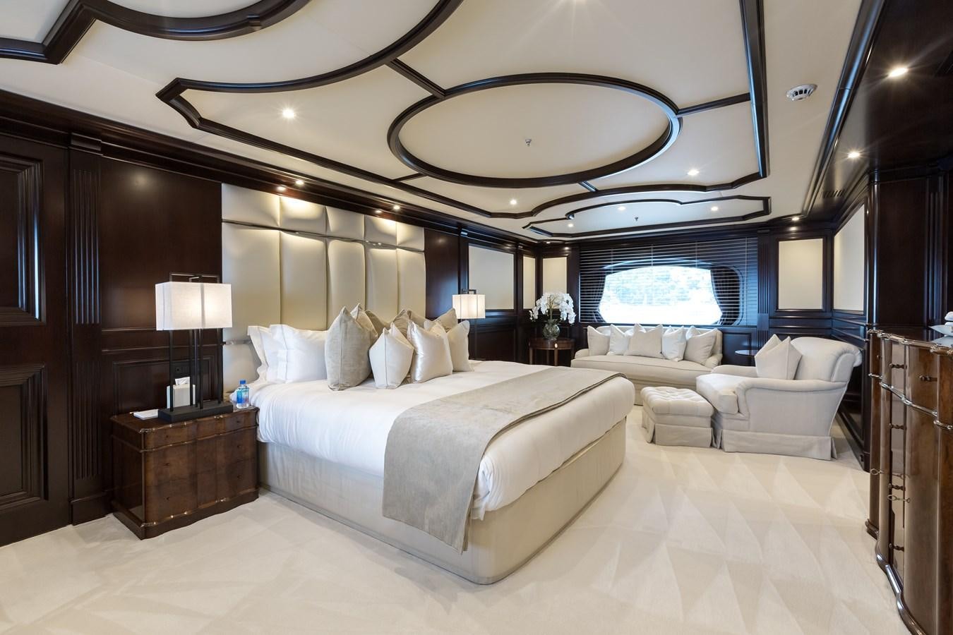 a large bedroom with a large bed aboard ELENI Yacht for Sale