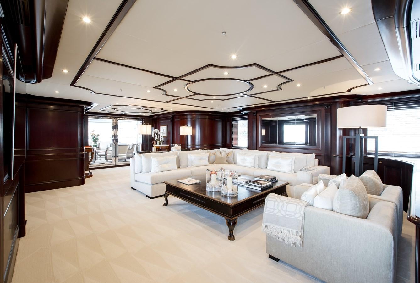 a living room with a large open floor plan aboard ELENI Yacht for Sale