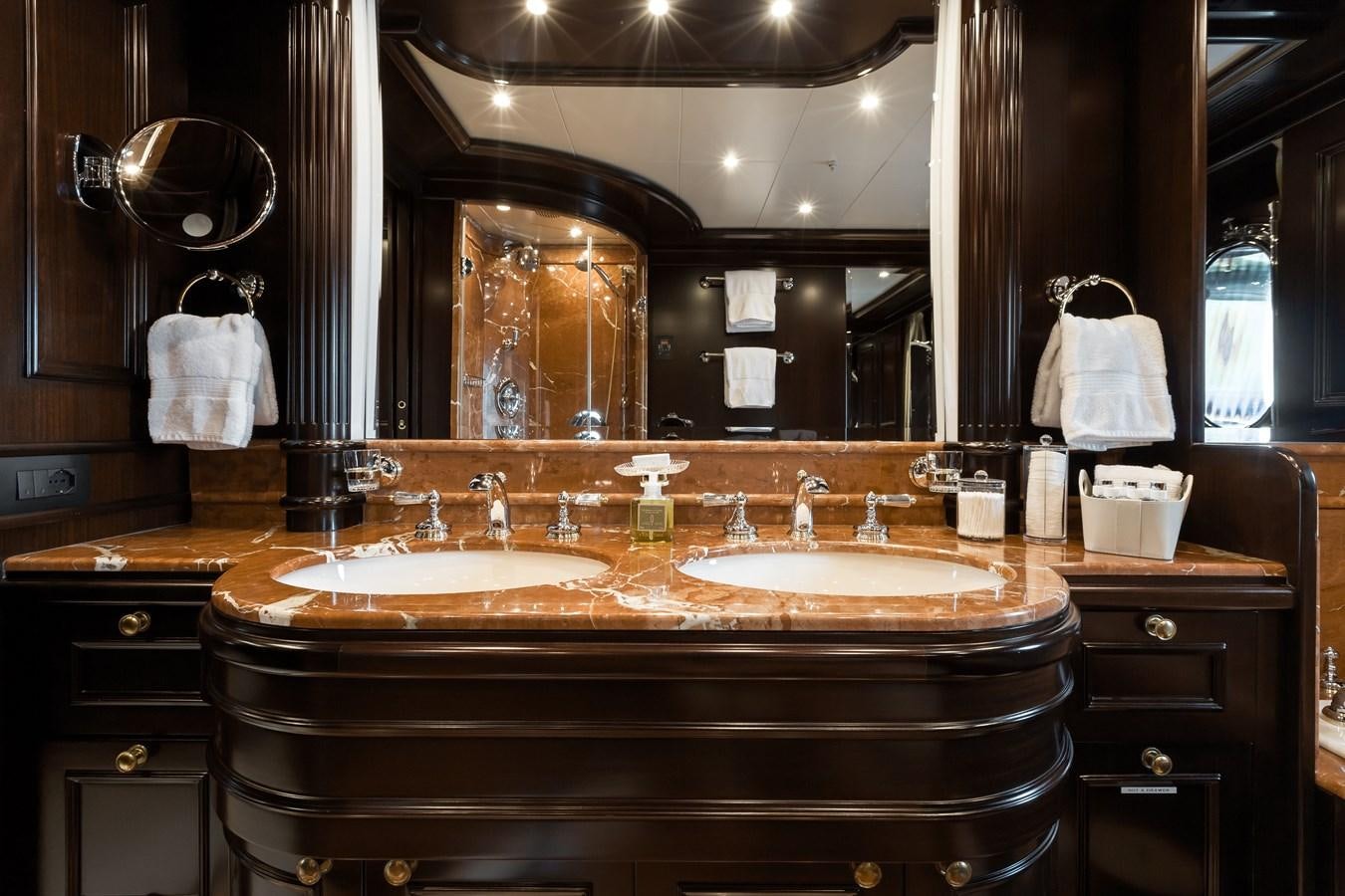a bathroom with double sinks aboard ELENI Yacht for Sale