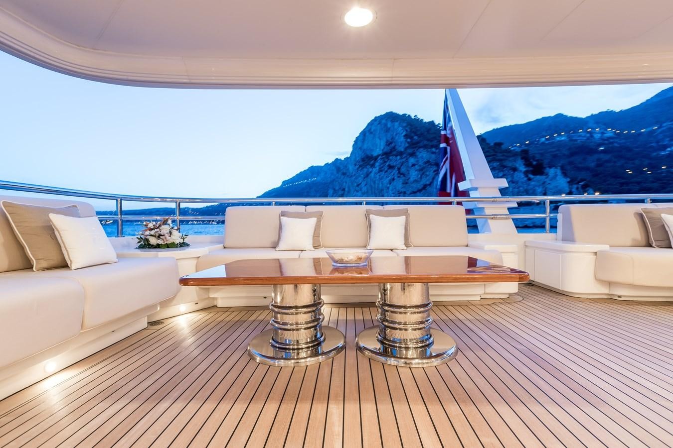 a living room with a large window aboard ELENI Yacht for Sale