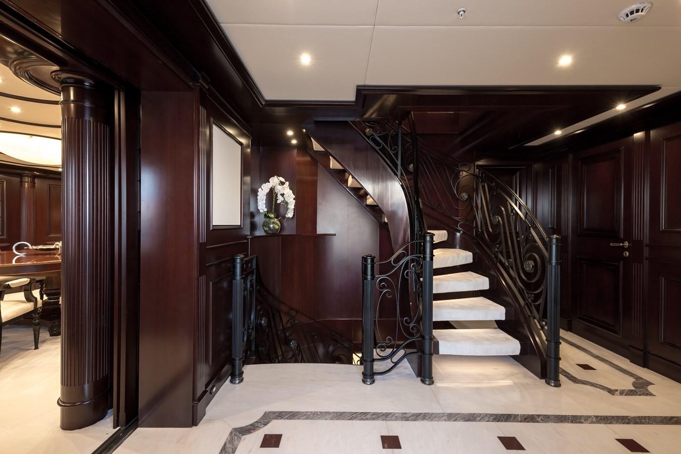 a hallway with a set of stairs aboard ELENI Yacht for Sale