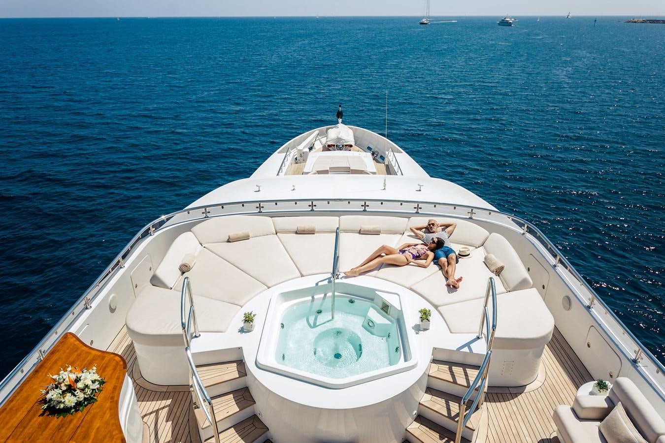 a man and a woman on a boat aboard ELENI Yacht for Sale