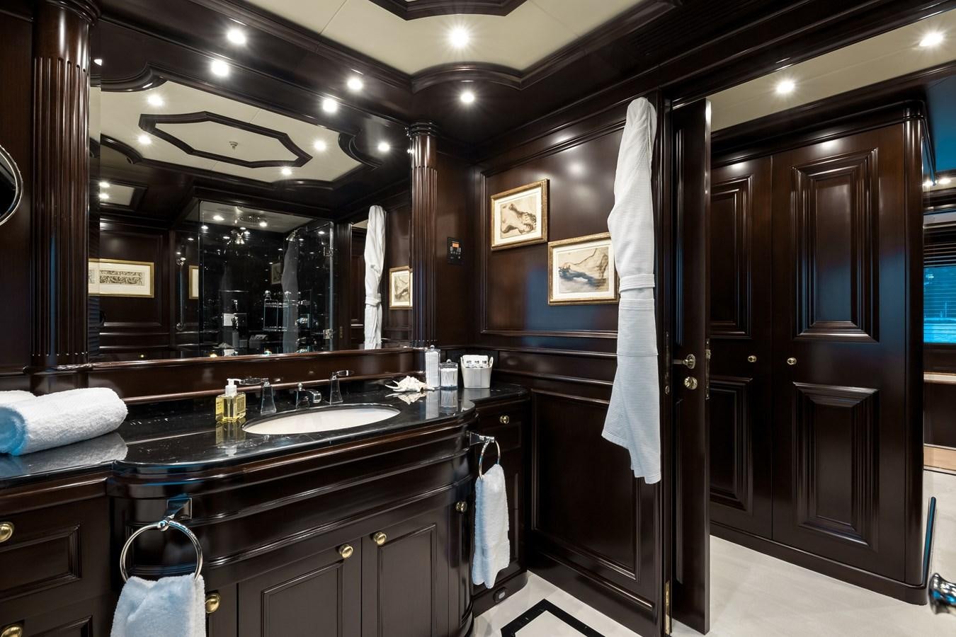 a bathroom with a sink and a mirror aboard ELENI Yacht for Sale