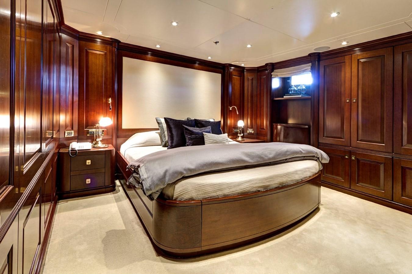 a large bed in a room aboard AZTECA Yacht for Sale