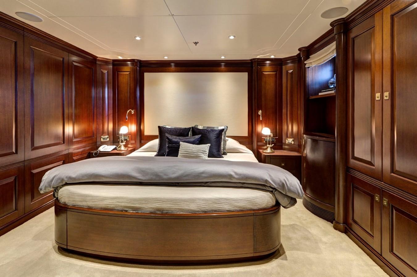 a bed in a room aboard AZTECA Yacht for Sale