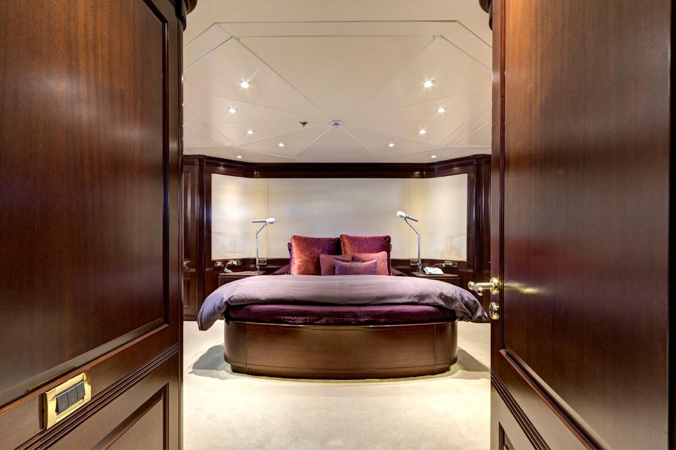 a bed in a room aboard AZTECA Yacht for Sale