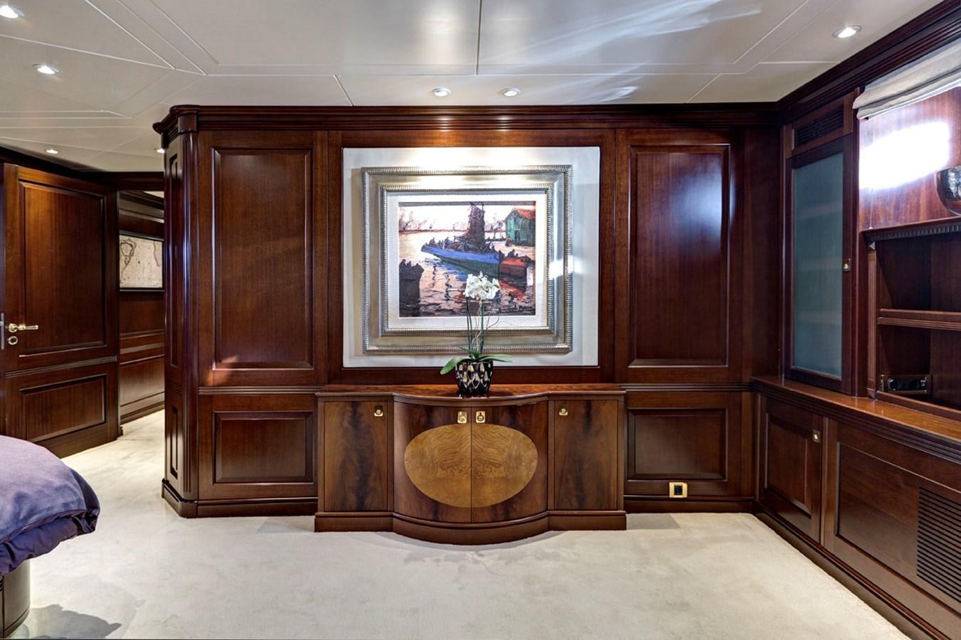 a room with a tv and a cabinet aboard AZTECA Yacht for Sale