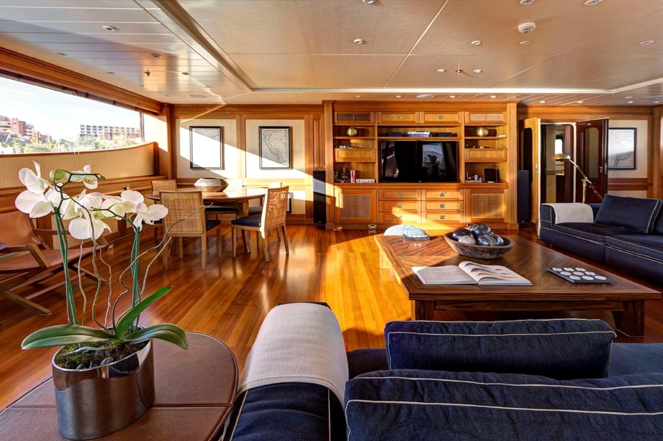 a living room with a large window aboard AZTECA Yacht for Sale