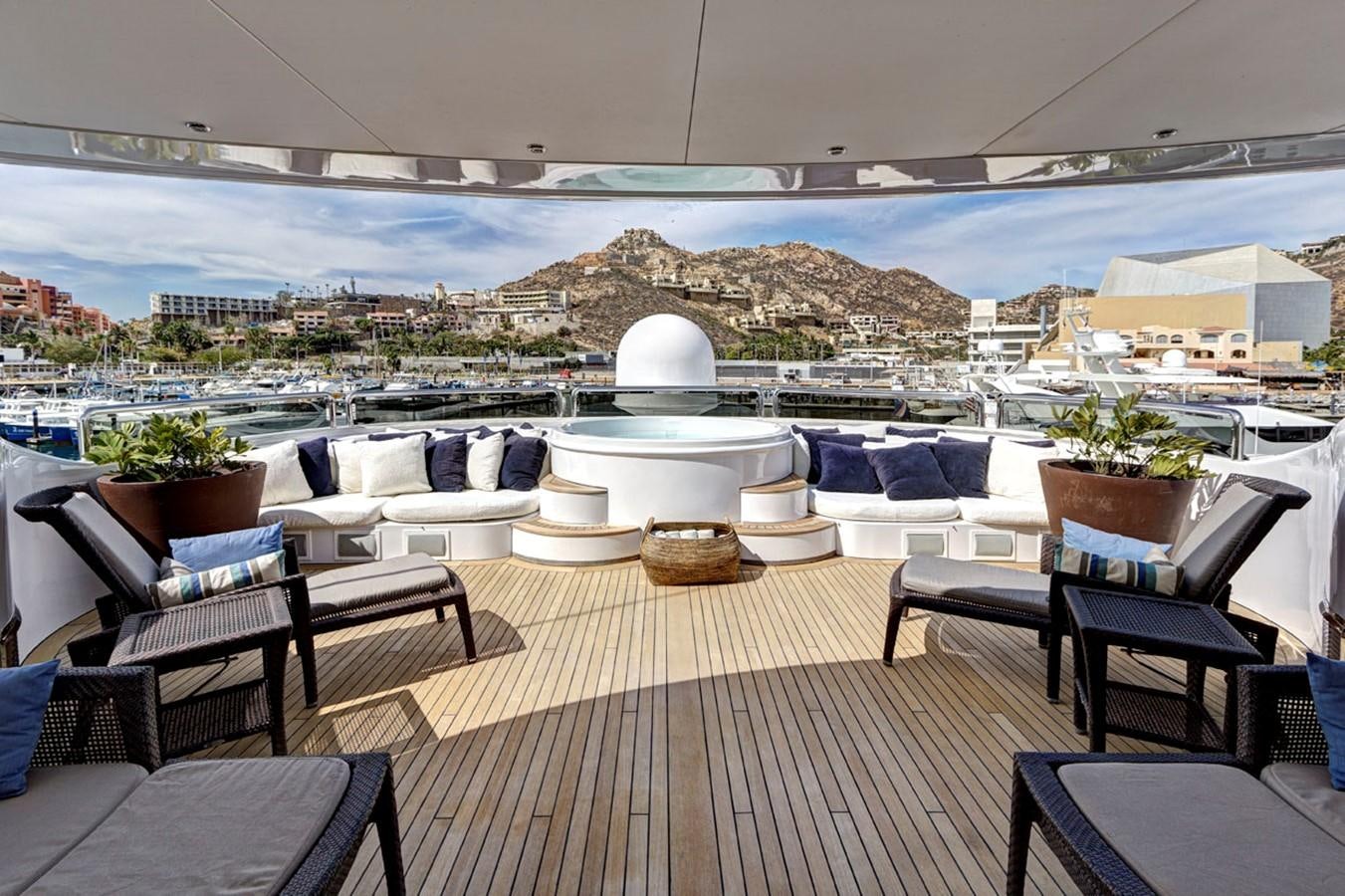 a deck with a large white tub and a large white building with a large white dome and a aboard AZTECA Yacht for Sale