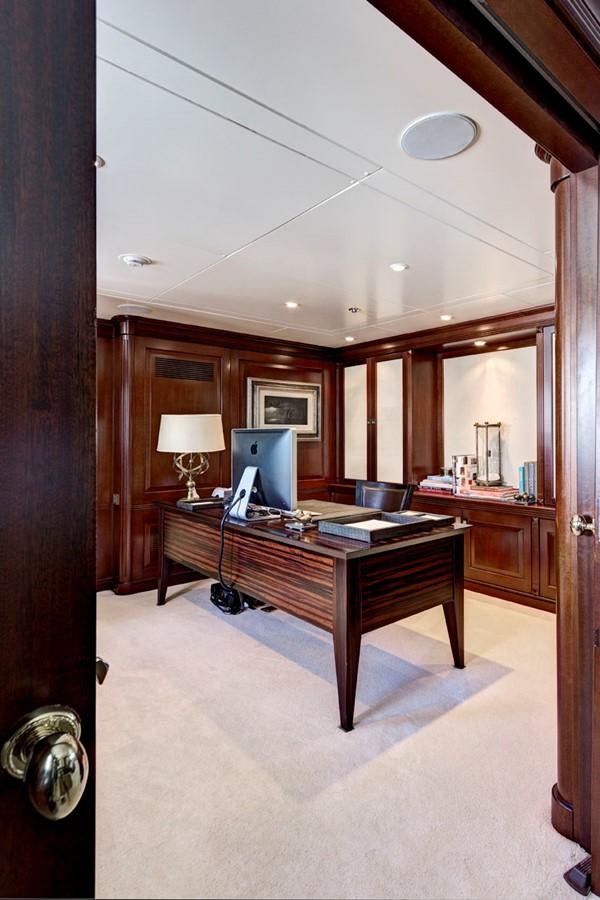 a large kitchen with a large island aboard AZTECA Yacht for Sale