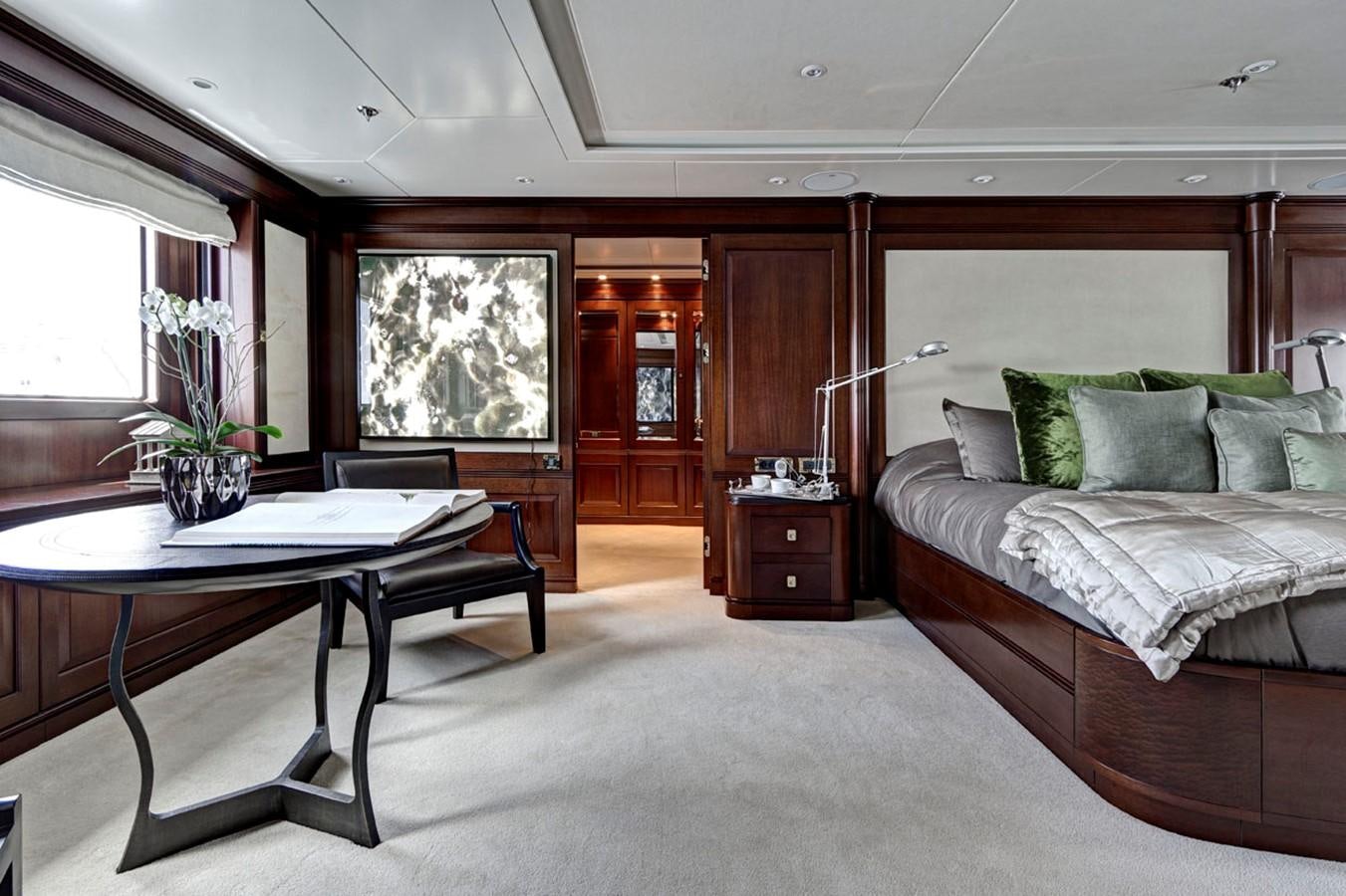 a living room with a couch and a table aboard AZTECA Yacht for Sale
