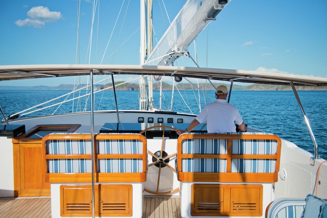 a person on a boat aboard MORNING GLORY Yacht for Sale