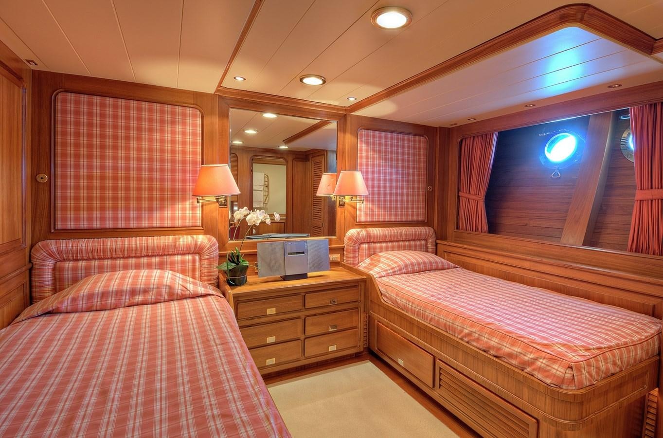 a couple of beds in a hotel room aboard MORNING GLORY Yacht for Sale