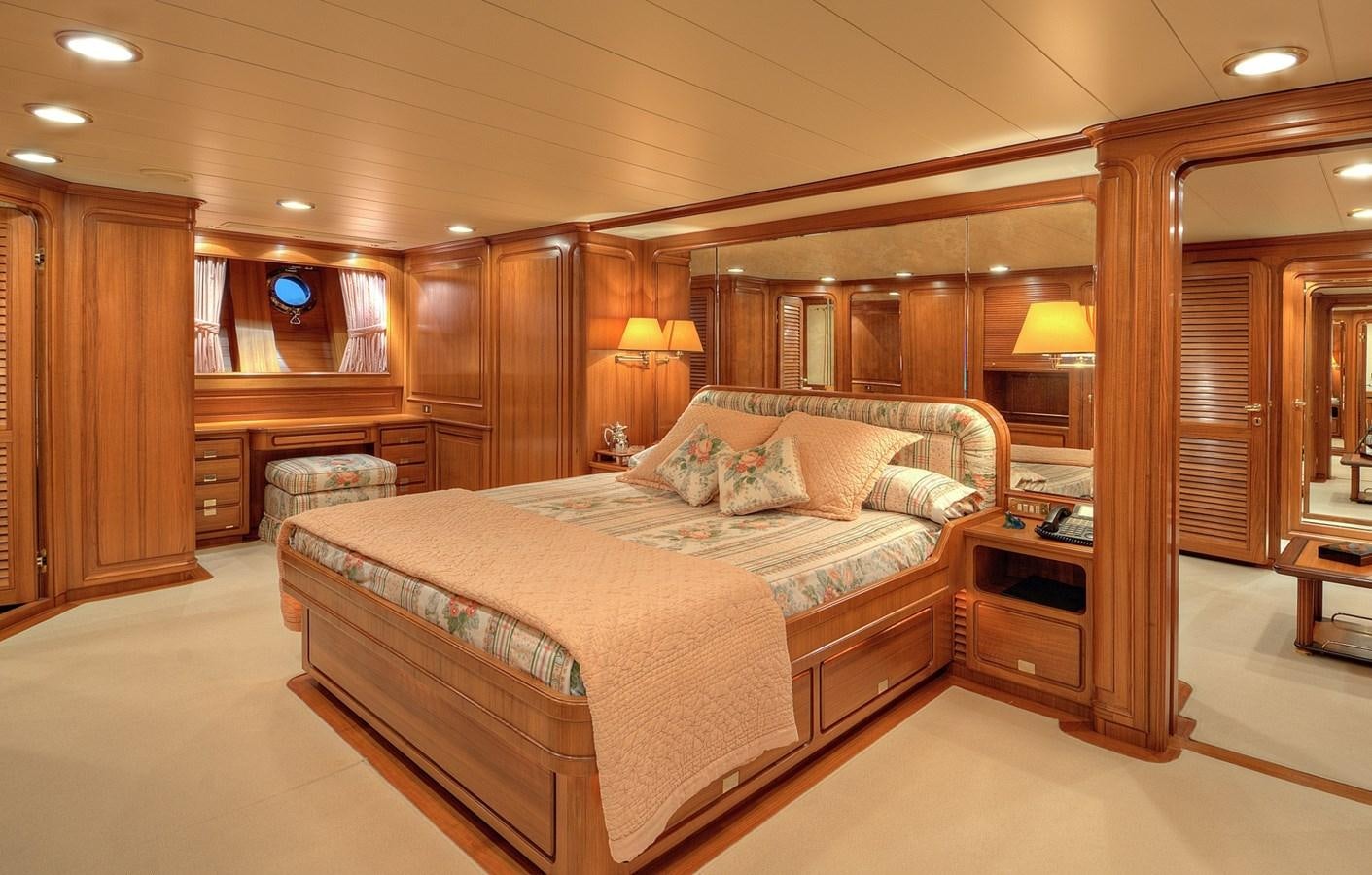 a large bedroom with a large bed aboard MORNING GLORY Yacht for Sale