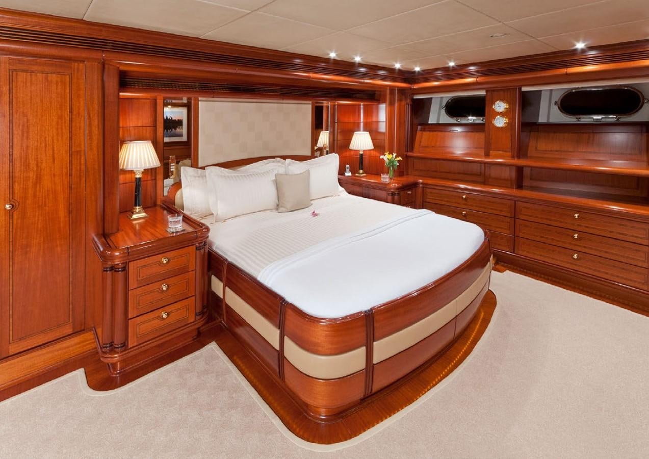 a large bed in a hotel room aboard HYPERION Yacht for Sale