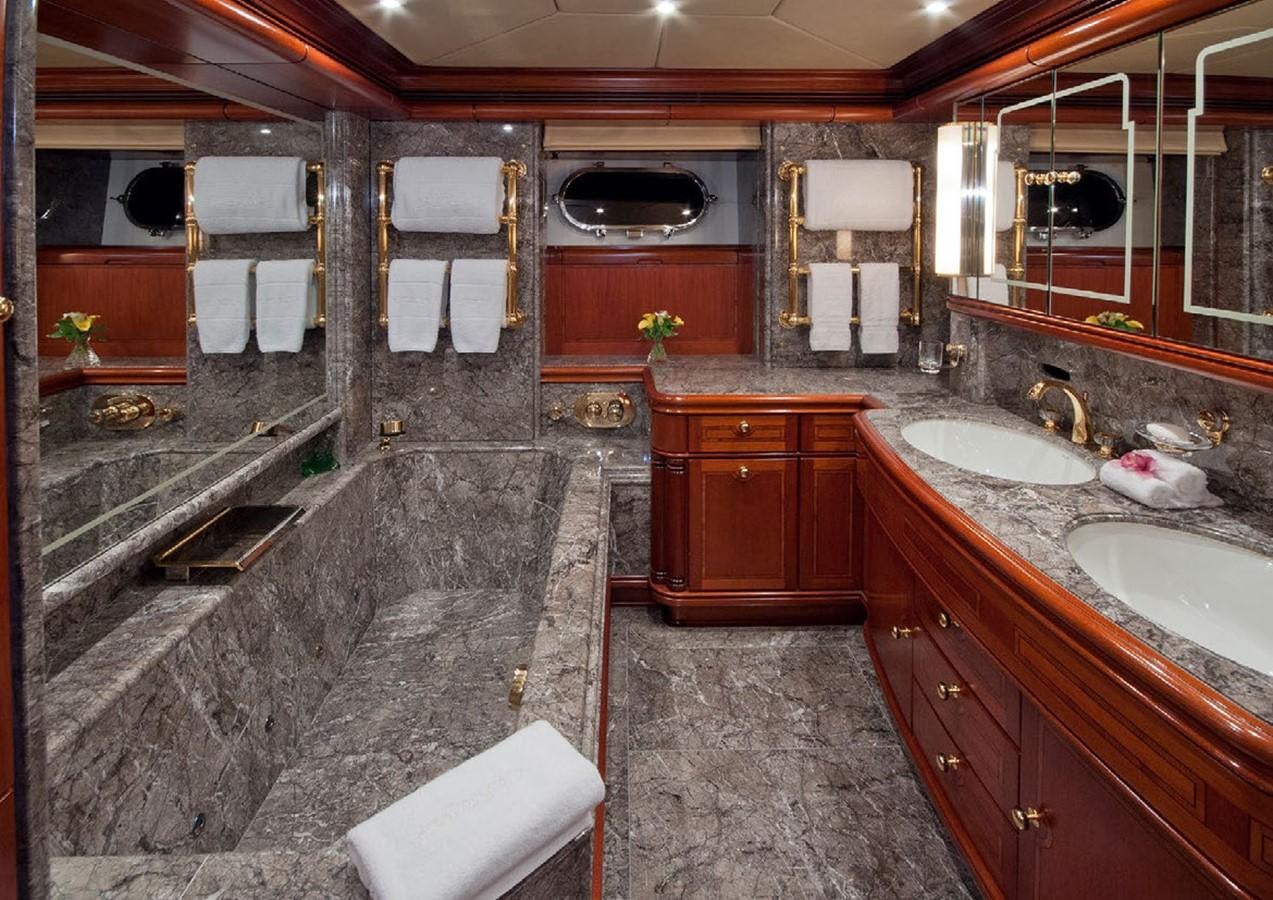 a bathroom with a large bathtub aboard HYPERION Yacht for Sale
